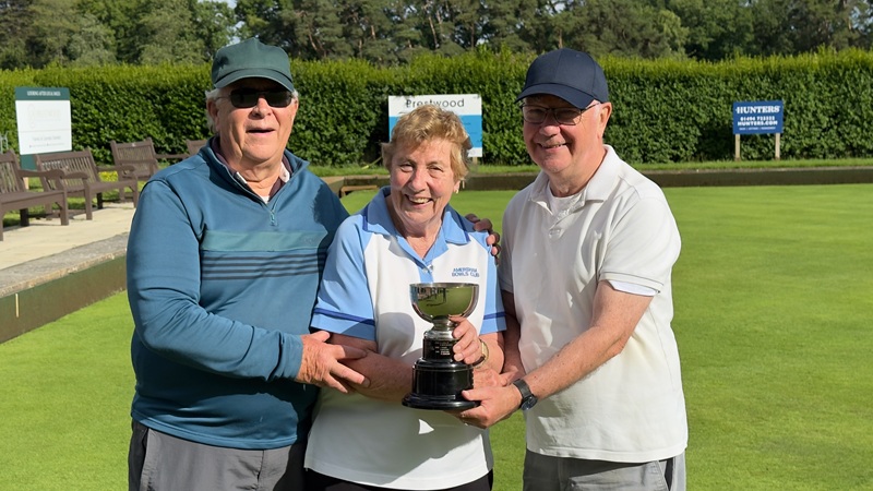 Anne Begley presents the trophy to David Watson and Steve Littlewood