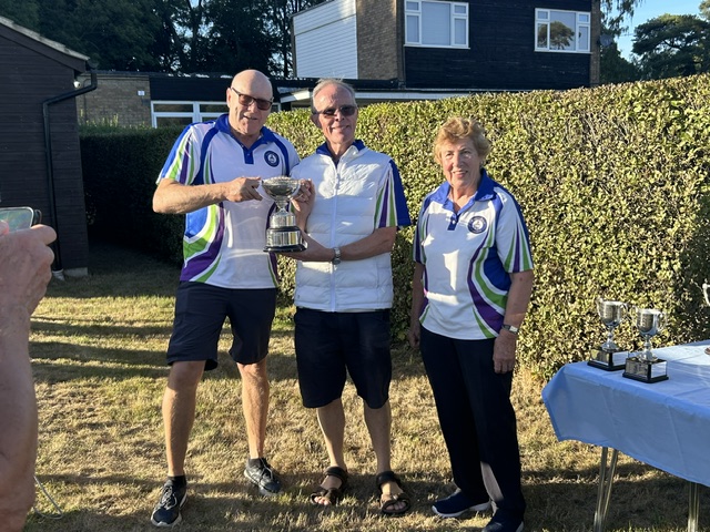 Men's Pairs winners David Fryman and Ralph Hilsdon receiving the trophy from Anne Begley. David Watson and David Smith were runners up.
